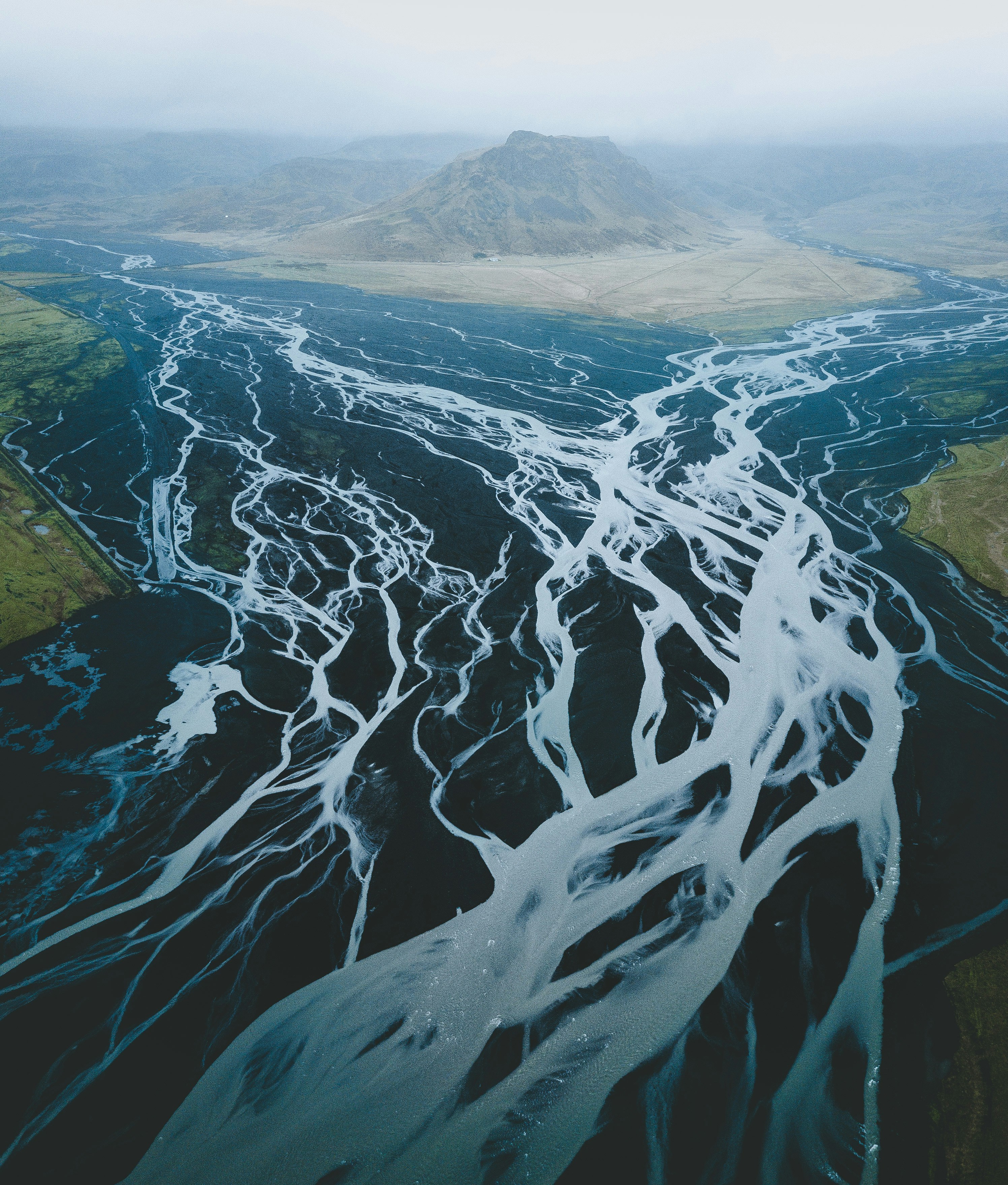Braided river channels converging into clarity